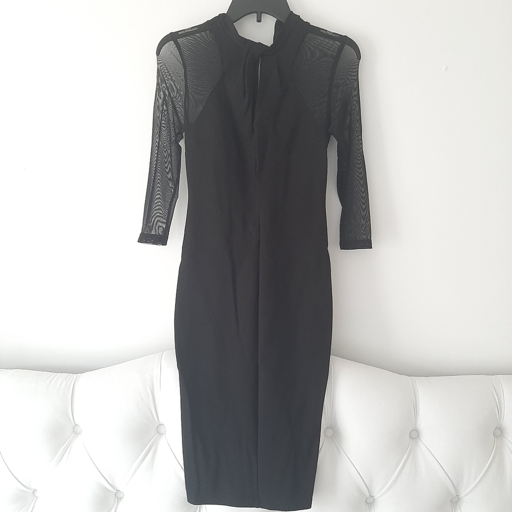 CATO sheer sleeved black Feminine fitted Holiday Party Vacation dress. Size 4.